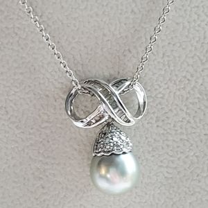 GIA Appraised 12.5MM Tahitian Pearl 18KT Baugette/Round Diamonds 16"